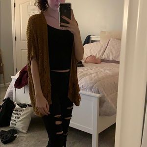 Rust color sleeveless knit sweater